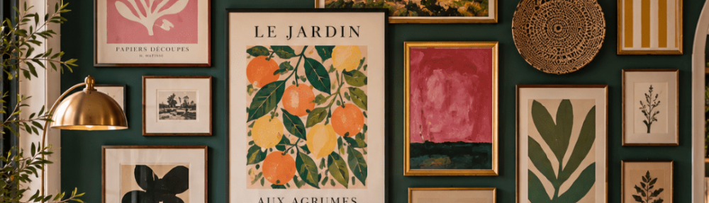 Bold gallery wall with colourful botanical, landscape and abstract artwork on a deep green wall above a cream sofa in a bright, stylish living room.